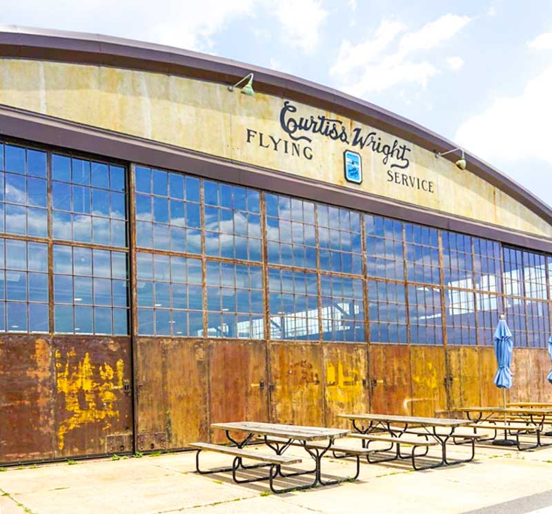 Exterior of Hunter-Gatherer's hangar brewery at Owens Field in Columbia, SC.