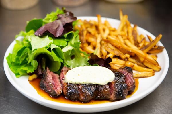 Steak Frites entree at Black Rooster in West Columbia