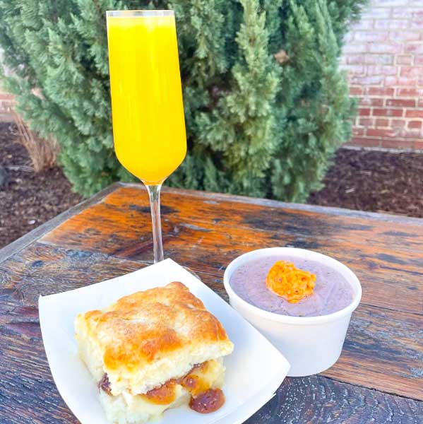 Biscuit, grits and a mimosa from Rambo's Fat Cat Biscuits in Columbia, SC